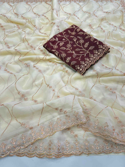 Ivory Charm Georgette Embroidered Saree